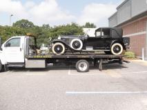 Service vehicle for All About Towing & Hauling